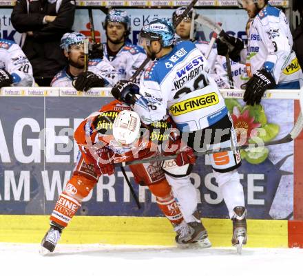 EBEL. Eishockey Bundesliga. EC KAC gegen EHC Liwest Black Wings Linz.  Johannes Reichel,  (KAC), Brett Engelhardt (Linz).. Klagenfurt, am 24.3.2013.
Foto: Kuess 


---
pressefotos, pressefotografie, kuess, qs, qspictures, sport, bild, bilder, bilddatenbank