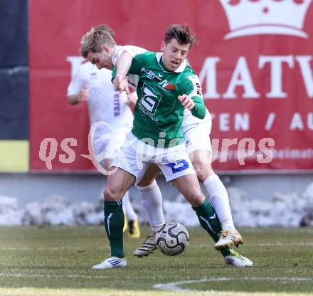 Fussball Regionalliga. SK Austria Klagenfurt gegen SV Wallern. Peter Pucker, (Austria Klagenfurt), Roman Hintersteiner (Wallern). Klagenfurt, 23.3.2013.
Foto: Kuess
---
pressefotos, pressefotografie, kuess, qs, qspictures, sport, bild, bilder, bilddatenbank