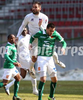 Fussball Regionalliga. SK Austria Klagenfurt gegen SV Wallern. Oliver Pusztai, (Austria Klagenfurt), Darijo Pecirep  (Wallern). Klagenfurt, 23.3.2013.
Foto: Kuess
---
pressefotos, pressefotografie, kuess, qs, qspictures, sport, bild, bilder, bilddatenbank