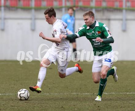 Fussball Regionalliga. SK Austria Klagenfurt gegen SV Wallern. Fabian Miesenboeck, (Austria Klagenfurt),  Philipp Haslgruber (Wallern). Klagenfurt, 23.3.2013.
Foto: Kuess
---
pressefotos, pressefotografie, kuess, qs, qspictures, sport, bild, bilder, bilddatenbank