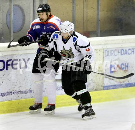 Eishockey NAHL. Finale. Tarco Woelfe Klagenfurt gegen Kapfenberg.  Christoph Ibounig, (Tarco), Darcy Werenka  (Kapfenberg). Klagenfurt, 30.3.2013.
Foto: Kuess
---
pressefotos, pressefotografie, kuess, qs, qspictures, sport, bild, bilder, bilddatenbank