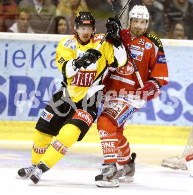 EBEL. Eishockey Bundesliga. EC KAC gegen PC Vienna Capitals.. Kirk Furey,  (KAC), Marcus Olsson (Caps). Klagenfurt, am 31.3.2013.
Foto: Kuess 


---
pressefotos, pressefotografie, kuess, qs, qspictures, sport, bild, bilder, bilddatenbank