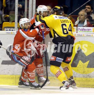 EBEL. Eishockey Bundesliga. EC KAC gegen PC Vienna Capitals.. Thomas Koch, (KAC), Andre Lakos  (Caps). Klagenfurt, am 31.3.2013.
Foto: Kuess 


---
pressefotos, pressefotografie, kuess, qs, qspictures, sport, bild, bilder, bilddatenbank