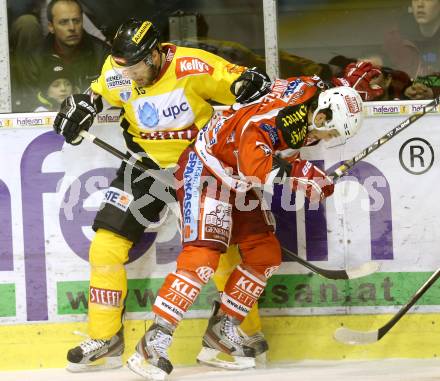 EBEL. Eishockey Bundesliga. EC KAC gegen PC Vienna Capitals.. Raphael Herburger,  (KAC), Francois Fortier (Caps). Klagenfurt, am 31.3.2013.
Foto: Kuess 


---
pressefotos, pressefotografie, kuess, qs, qspictures, sport, bild, bilder, bilddatenbank