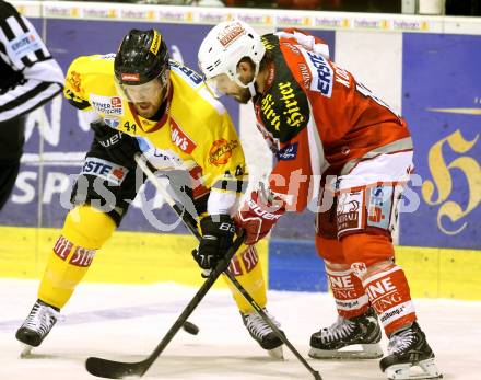 EBEL. Eishockey Bundesliga. EC KAC gegen PC Vienna Capitals.. Thomas Koch, (KAC), Jamie Fraser  (Caps). Klagenfurt, am 31.3.2013.
Foto: Kuess 


---
pressefotos, pressefotografie, kuess, qs, qspictures, sport, bild, bilder, bilddatenbank