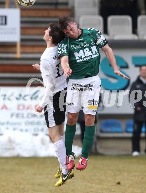 Fussball Regionalliga. Feldkirchen gegen St. Florian. Mathias Regal (Feldkirchen), Florian Krennmayr (St. Florian). Feldkirchen, am 1.4.2013.
Foto: Kuess
---
pressefotos, pressefotografie, kuess, qs, qspictures, sport, bild, bilder, bilddatenbank