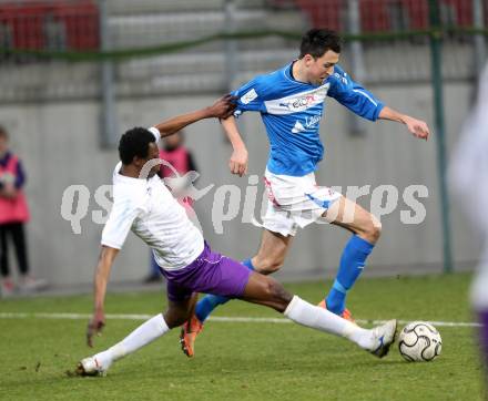 Fussball Regionalliga. SK Austria Klagenfurt gegen VSV. Eric Akoto, (Austria Klagenfurt), Dejan Kecanovic  (VSV). Klagenfurt, 5.4.2013.
Foto: Kuess
---
pressefotos, pressefotografie, kuess, qs, qspictures, sport, bild, bilder, bilddatenbank