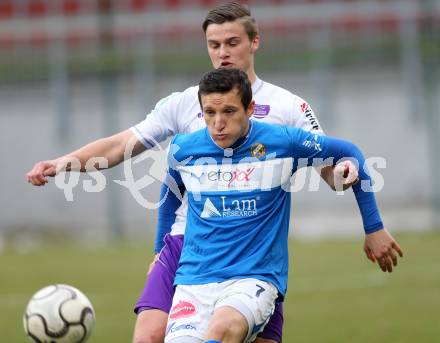 Fussball Regionalliga. SK Austria Klagenfurt gegen VSV. Michael Tschemernjak,  (Austria Klagenfurt), Emre Okatan (VSV). Klagenfurt, 5.4.2013.
Foto: Kuess
---
pressefotos, pressefotografie, kuess, qs, qspictures, sport, bild, bilder, bilddatenbank