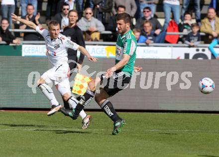 Fussball. Bundesliga. RZ Pellets WAC gegen SV Josko Ried.  Manuel Kerhe,   (WAC), Andreas Schicker (Ried). Wolfsberg, 13.4.2013.
Foto: Kuess

---
pressefotos, pressefotografie, kuess, qs, qspictures, sport, bild, bilder, bilddatenbank