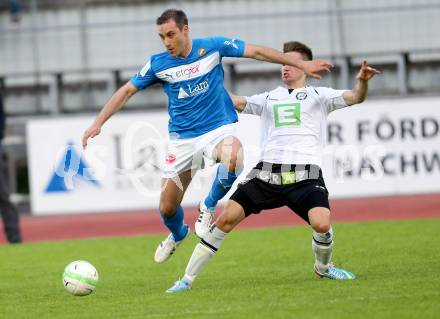 Fussball Regionalliga. VSV gegen Sturm Graz Amateure. Marco Reich, (VSV), Erman Bevab  (Graz). Villach, 26.4.2013.
Foto: Kuess
---
pressefotos, pressefotografie, kuess, qs, qspictures, sport, bild, bilder, bilddatenbank