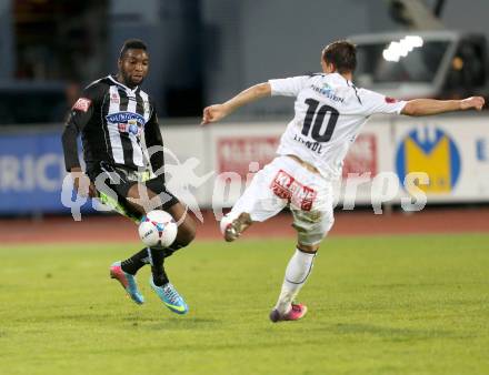 Fussball. OEB Cup.  RZ Pellets WAC gegen SK Puntigamer Sturm Graz.  Michael Liendl, (WAC), Richard Sukuta  (Graz). Wolfsberg, 27.4.2013.
Foto: Kuess

---
pressefotos, pressefotografie, kuess, qs, qspictures, sport, bild, bilder, bilddatenbank