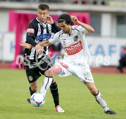 Fussball. Bundesliga.  RZ Pellets WAC gegen SK Puntigamer Sturm Graz.  Jacobo, (WAC), Milan Dudic  (Graz). Wolfsberg, 27.4.2013.
Foto: Kuess

---
pressefotos, pressefotografie, kuess, qs, qspictures, sport, bild, bilder, bilddatenbank