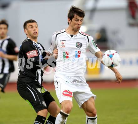 Fussball. Bundesliga.  RZ Pellets WAC gegen SK Puntigamer Sturm Graz.  Mihret Topcagic, (WAC),  Milan Dudic   (Graz). Wolfsberg, 27.4.2013.
Foto: Kuess

---
pressefotos, pressefotografie, kuess, qs, qspictures, sport, bild, bilder, bilddatenbank