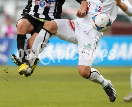 Fussball. Bundesliga.  RZ Pellets WAC gegen SK Puntigamer Sturm Graz.  Feature. Fussball. Zweikampf. Wolfsberg, 27.4.2013.
Foto: Kuess

---
pressefotos, pressefotografie, kuess, qs, qspictures, sport, bild, bilder, bilddatenbank