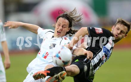 Fussball. Bundesliga.  RZ Pellets WAC gegen SK Puntigamer Sturm Graz.  Dario Baldauf,  (WAC), David Schloffer (Graz). Wolfsberg, 27.4.2013.
Foto: Kuess

---
pressefotos, pressefotografie, kuess, qs, qspictures, sport, bild, bilder, bilddatenbank