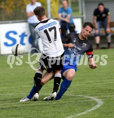 Fussball. Kaerntner Liga. Bleiburg gegen Steinfeld. Oswaldi Patrick Paul (Bleiburg), Pirker Thomas (K) (Steinfeld).
Bleiburg, 1.5.2013.
Foto: Kuess
---
pressefotos, pressefotografie, kuess, qs, qspictures, sport, bild, bilder, bilddatenbank