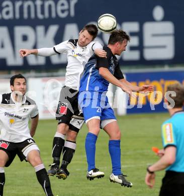 Fussball. Kaerntner Liga. Bleiburg gegen Steinfeld. Petschnig Mario Andreas (Bleiburg), Gaspersic Roman Stefan (Steinfeld).
Bleiburg, 1.5.2013.
Foto: Kuess
---
pressefotos, pressefotografie, kuess, qs, qspictures, sport, bild, bilder, bilddatenbank