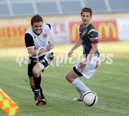 Fussball Kaerntner Liga. St. Veit gegen Maria Saal. Michael Rebernig, (St.Veit), Martin Poeck  (Maria Saal).
St. Veit, 3.5.2013.
Foto: Kuess
---
pressefotos, pressefotografie, kuess, qs, qspictures, sport, bild, bilder, bilddatenbank