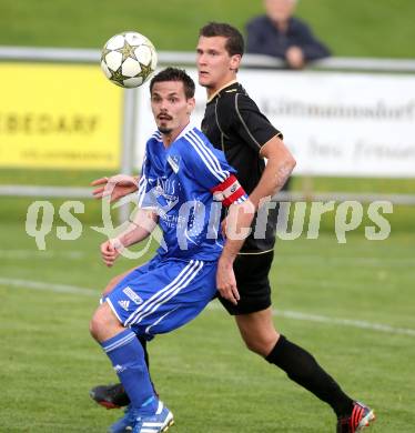 Fussball Kaerntner Liga. Koettmannsdorf gegen Treibach. Christoph Pibal(Koettmannsdorf), Mario Mattersdorfer (Treibach). Koettmannsdorf, am 5.5.2013.
Foto: Kuess 
---
pressefotos, pressefotografie, kuess, qs, qspictures, sport, bild, bilder, bilddatenbank