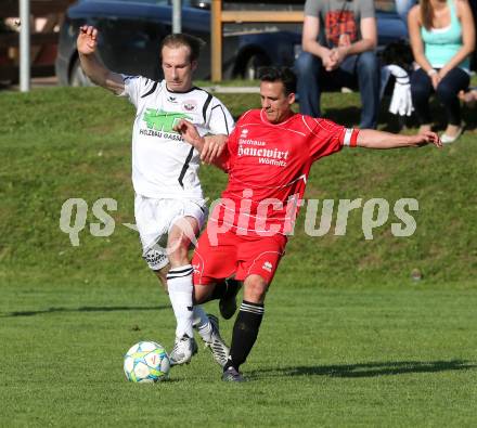 Fussball Unterliga Ost. Ludmannsdorf gegen Woelfnitz. Christian Glantschnig (Ludmannsdorf), Rene Primig (Woelfnitz). Ludmannsdorf, am 9.5.2013.
Foto: Kuess
---
pressefotos, pressefotografie, kuess, qs, qspictures, sport, bild, bilder, bilddatenbank