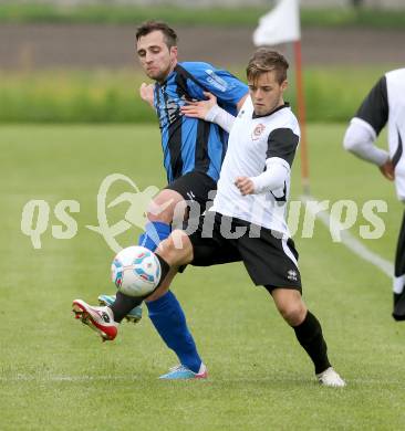 Fussball Kaerntner Liga. Maria Saal gegen SG Drautal. Michael Fick,  (Maria Saal), Benjamin Koslitsch (Drautal). Maria Saal, 11.4.2013.
Foto: Kuess
---
pressefotos, pressefotografie, kuess, qs, qspictures, sport, bild, bilder, bilddatenbank