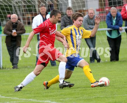 Fussball. Unterliga Ost. Woelfnitz gegen Liebenfels. Lambacher Guido (Woelfnitz), Strutzmann Daniel (Liebenfels). Woelfnitz, 12.5.2013.
Foto: Kuess 
---
pressefotos, pressefotografie, kuess, qs, qspictures, sport, bild, bilder, bilddatenbank