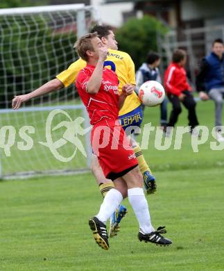 Fussball. Unterliga Ost. Woelfnitz gegen Liebenfels. Pirker Michael (Woelfnitz), Koechl Georg Franz (Liebenfels). Woelfnitz, 12.5.2013.
Foto: Kuess 
---
pressefotos, pressefotografie, kuess, qs, qspictures, sport, bild, bilder, bilddatenbank