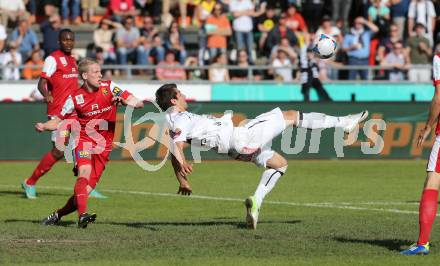 Fussball Bundesliga. RZ Pellets WAC gegen FC Admira Wacker Moedling.  Mihret Topcagic,  (WAC), Bernhard Schachner (Moedling). Wolfsberg, 18.5.2013.
Foto: Kuess

---
pressefotos, pressefotografie, kuess, qs, qspictures, sport, bild, bilder, bilddatenbank