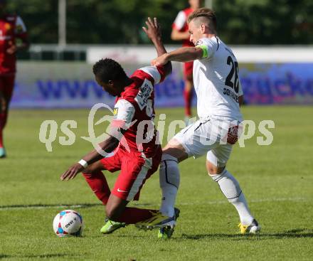 Fussball Bundesliga. RZ Pellets WAC gegen FC Admira Wacker Moedling.  Michael Sollbauer, (WAC),  Issiaka Ouedraogo (Moedling). Wolfsberg, 18.5.2013.
Foto: Kuess

---
pressefotos, pressefotografie, kuess, qs, qspictures, sport, bild, bilder, bilddatenbank