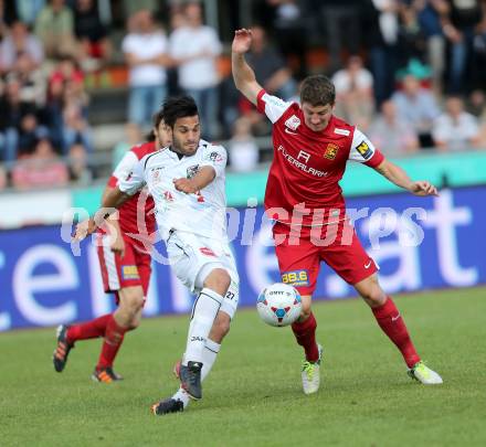 Fussball Bundesliga. RZ Pellets WAC gegen FC Admira Wacker Moedling.  Michele Polverino, (WAC), Stephan Auer  (Moedling). Wolfsberg, 18.5.2013.
Foto: Kuess

---
pressefotos, pressefotografie, kuess, qs, qspictures, sport, bild, bilder, bilddatenbank