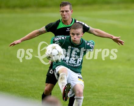 Fussball Regionalliga. Feldkirchen gegen Pasching. Michael Groinig, (Feldkirchen), Daniel Kerschbaumer (Pasching). Feldkirchen, 24.5.2013.
Foto: Kuess
---
pressefotos, pressefotografie, kuess, qs, qspictures, sport, bild, bilder, bilddatenbank