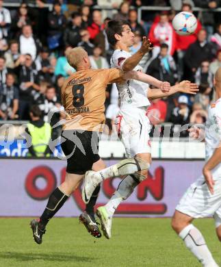 Fussball Bundesliga. RZ Pellets WAC gegen FC Wacker Innsbruck.. Mihret Topcagic,  (WAC), Martin Svejnoha (Innsbruck). Wolfsberg, 26.5.2013.
Foto: Kuess

---
pressefotos, pressefotografie, kuess, qs, qspictures, sport, bild, bilder, bilddatenbank