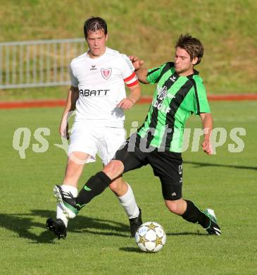 Fussball Kaerntner Liga. Voelkermarkt gegen ATUS Ferlach. Fabian Ladinig, (Voelkermarkt), Thomas Waldhauser  (Ferlach). Voelkermarkt, 7. 6. 2013-
Foto: Kuess
---
pressefotos, pressefotografie, kuess, qs, qspictures, sport, bild, bilder, bilddatenbank