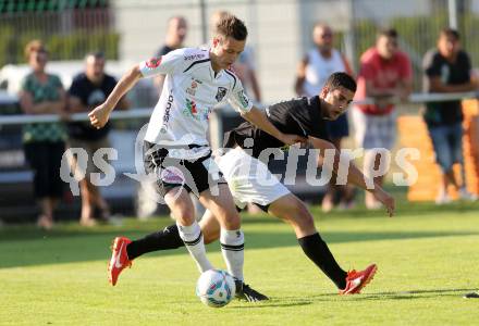 Fussball Bundesliga. Testspiel. Magdalen gegen RZ Pellets WAC. Dominik Vukoja,  (Magdalen), Kevin Vaschauner (WAC). Magdalen, 22.6.2013.
Foto: Kuess 
---
pressefotos, pressefotografie, kuess, qs, qspictures, sport, bild, bilder, bilddatenbank