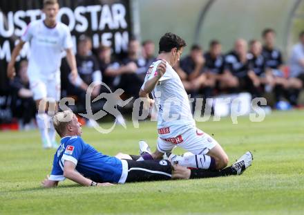 Fussball Testspiel. FK Austria Wien gegen Arminia Bielefeld. Philipp Hosiner (Wien), Manuel Hornig (Bielefeld). Velden, am 2.7.2013.
Foto: Kuess
---
pressefotos, pressefotografie, kuess, qs, qspictures, sport, bild, bilder, bilddatenbank