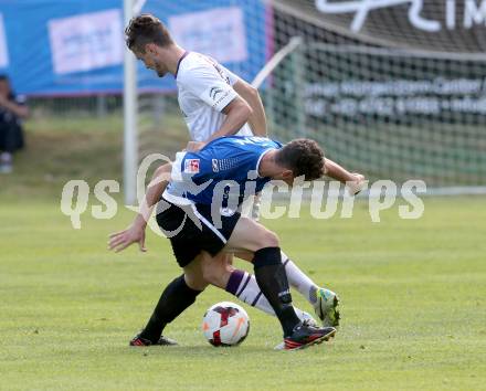 Fussball Testspiel. FK Austria Wien gegen Arminia Bielefeld.  James Holland (Wien), Dennis Riemer (Bielefeld). Velden, am 2.7.2013.
Foto: Kuess
---
pressefotos, pressefotografie, kuess, qs, qspictures, sport, bild, bilder, bilddatenbank