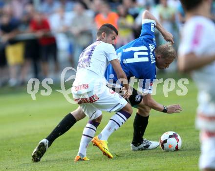 Fussball Testspiel. FK Austria Wien gegen Arminia Bielefeld.  Srdan Spiridonovic (Wien), Manuel Lorenz (Bielefeld). Velden, am 2.7.2013.
Foto: Kuess
---
pressefotos, pressefotografie, kuess, qs, qspictures, sport, bild, bilder, bilddatenbank