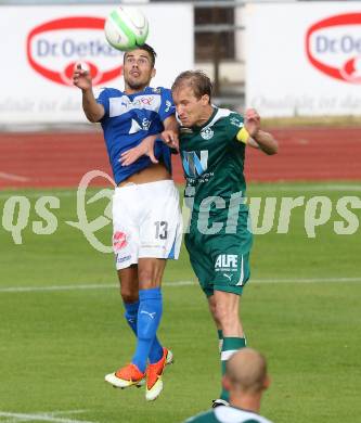 Fussball OEFB Cup. VSV gegen Wattens. Sandro Ebner,  (VSV), Martin Weissenbrunner (Wattens). Villlach, 13.7.2013.
Foto: Kuess 
---
pressefotos, pressefotografie, kuess, qs, qspictures, sport, bild, bilder, bilddatenbank