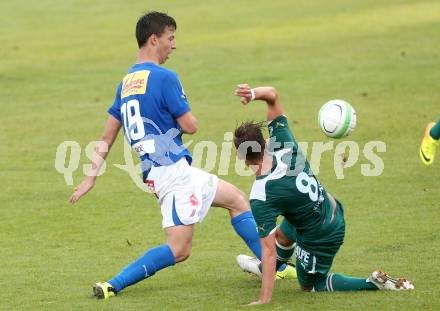 Fussball OEFB Cup. VSV gegen Wattens. Luka Caculovic,  (VSV), Harald Cihak (Wattens). Villlach, 13.7.2013.
Foto: Kuess 
---
pressefotos, pressefotografie, kuess, qs, qspictures, sport, bild, bilder, bilddatenbank