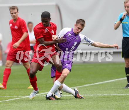 Fussball. OEFB Cup. Austria Klagenfurt gegen Wiener Viktoria.  Patrik Eler  (Klagenfurt), Nigel Blair (Wien). Klagenfurt, 13.7.2013.
Foto: Kuess
---
pressefotos, pressefotografie, kuess, qs, qspictures, sport, bild, bilder, bilddatenbank