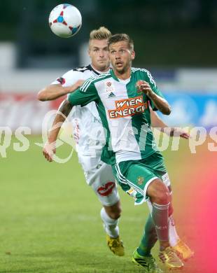 Fussball Bundesliga. RZ Pellets WAC gegen SK Rapid Wien. Michael Sollbauer,  (WAC), Guido Burgstaller (Rapid). Wolfsberg, 20.7.2013.
Foto: Kuess

---
pressefotos, pressefotografie, kuess, qs, qspictures, sport, bild, bilder, bilddatenbank