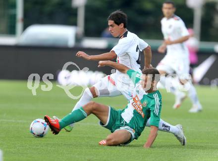 Fussball Bundesliga. RZ Pellets WAC gegen SK Rapid Wien. David De Paula,  (WAC), Dominik Wydra (Rapid). Wolfsberg, 20.7.2013.
Foto: Kuess

---
pressefotos, pressefotografie, kuess, qs, qspictures, sport, bild, bilder, bilddatenbank