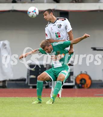 Fussball Bundesliga. RZ Pellets WAC gegen SK Rapid Wien. Nenad Jovanovic,  (WAC), Guido Burgstaller (Rapid). Wolfsberg, 20.7.2013.
Foto: Kuess

---
pressefotos, pressefotografie, kuess, qs, qspictures, sport, bild, bilder, bilddatenbank