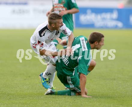 Fussball Bundesliga. RZ Pellets WAC gegen SK Rapid Wien. Manuel Kerhe, (WAC), Thomas Schrammel  (Rapid). Wolfsberg, 20.7.2013.
Foto: Kuess

---
pressefotos, pressefotografie, kuess, qs, qspictures, sport, bild, bilder, bilddatenbank