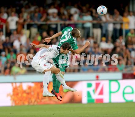 Fussball Bundesliga. RZ Pellets WAC gegen SK Rapid Wien. Mihret Topcagic,  (WAC), Christopher Dibon (Rapid). Wolfsberg, 20.7.2013.
Foto: Kuess

---
pressefotos, pressefotografie, kuess, qs, qspictures, sport, bild, bilder, bilddatenbank