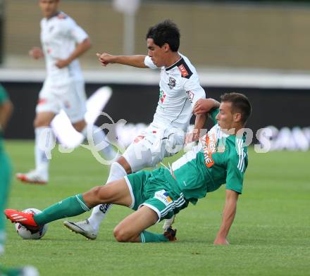 Fussball Bundesliga. RZ Pellets WAC gegen SK Rapid Wien. David De Paula,  (WAC), Dominik Wydra (Rapid). Wolfsberg, 20.7.2013.
Foto: Kuess

---
pressefotos, pressefotografie, kuess, qs, qspictures, sport, bild, bilder, bilddatenbank