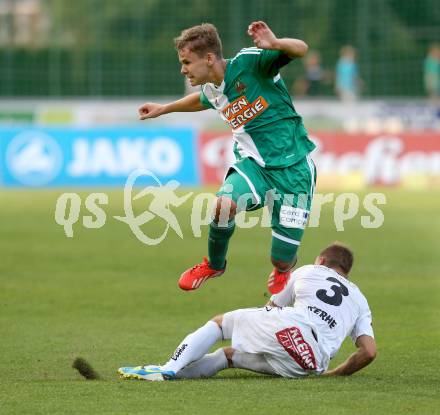 Fussball Bundesliga. RZ Pellets WAC gegen SK Rapid Wien. Manuel Kerhe, (WAC), Louis Schaub  (Rapid). Wolfsberg, 20.7.2013.
Foto: Kuess

---
pressefotos, pressefotografie, kuess, qs, qspictures, sport, bild, bilder, bilddatenbank