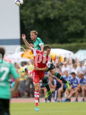 Fussball Testspiel. FC Schalke 04 gegen Southampton. Benedijt Hoewedes,  (Schalke), Rickie Lambert (Southampton). Villach, am 24.7.2013.
Foto: Kuess
---
pressefotos, pressefotografie, kuess, qs, qspictures, sport, bild, bilder, bilddatenbank