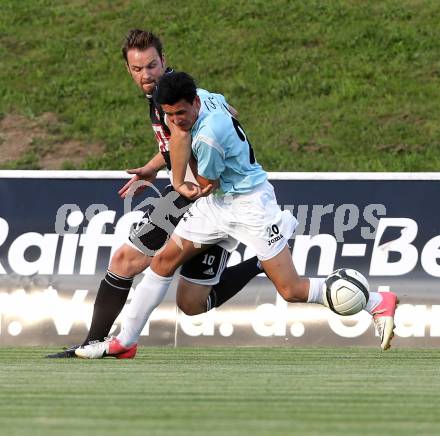 Fussball Kaerntner Liga. St. Veit gegen Gmuend. Raphael Lamzari (St. Veit), Udo Gasser (Gmuend). St. Veit, am 26.7.2013.
Foto: Kuess
---
pressefotos, pressefotografie, kuess, qs, qspictures, sport, bild, bilder, bilddatenbank