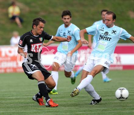 Fussball Kaerntner Liga. St. Veit gegen Gmuend. Roman Tengg (St. Veit), Nico Moser (Gmuend). St. Veit, am 26.7.2013.
Foto: Kuess
---
pressefotos, pressefotografie, kuess, qs, qspictures, sport, bild, bilder, bilddatenbank